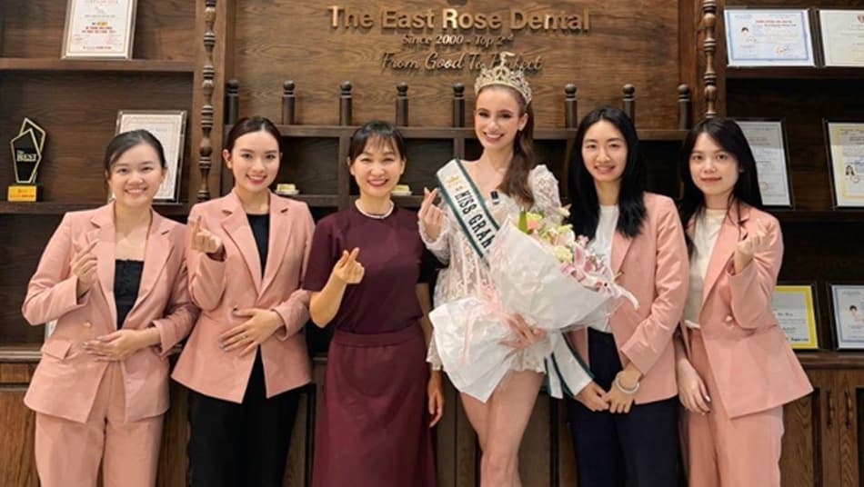Dr. Nguyen Thu Thuy and Layanna Robinson – Miss Grand Canada 2025 with staff