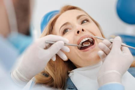Is tartar removal painful? Does it damage the enamel?