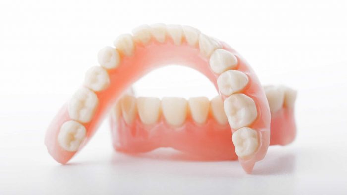 How much does it cost to perform a removable denture?